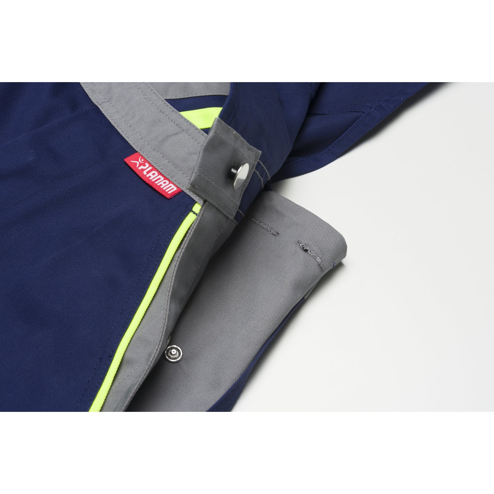 Planam Visline Dungarees black/orange/zinc - Greater freedom of movement thanks to the practical options for adjusting the waistband