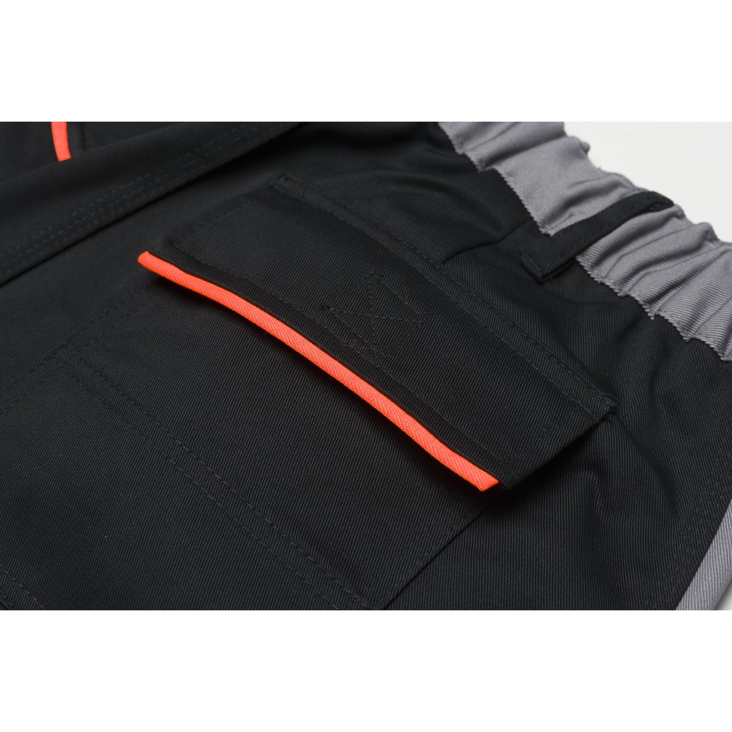 Planam Visline Trousers green/orange/slate - Everything stays securely stowed away in the rear pocket with flap.