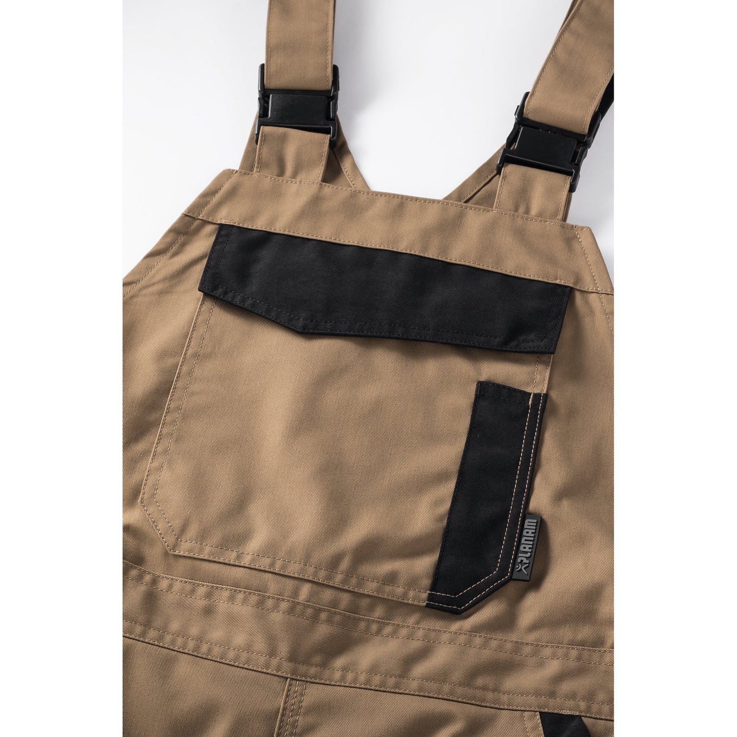 Planam Norit Women's dungarees royal blue/black - The bib with zip closure and bib pocket provide plenty of storage space.