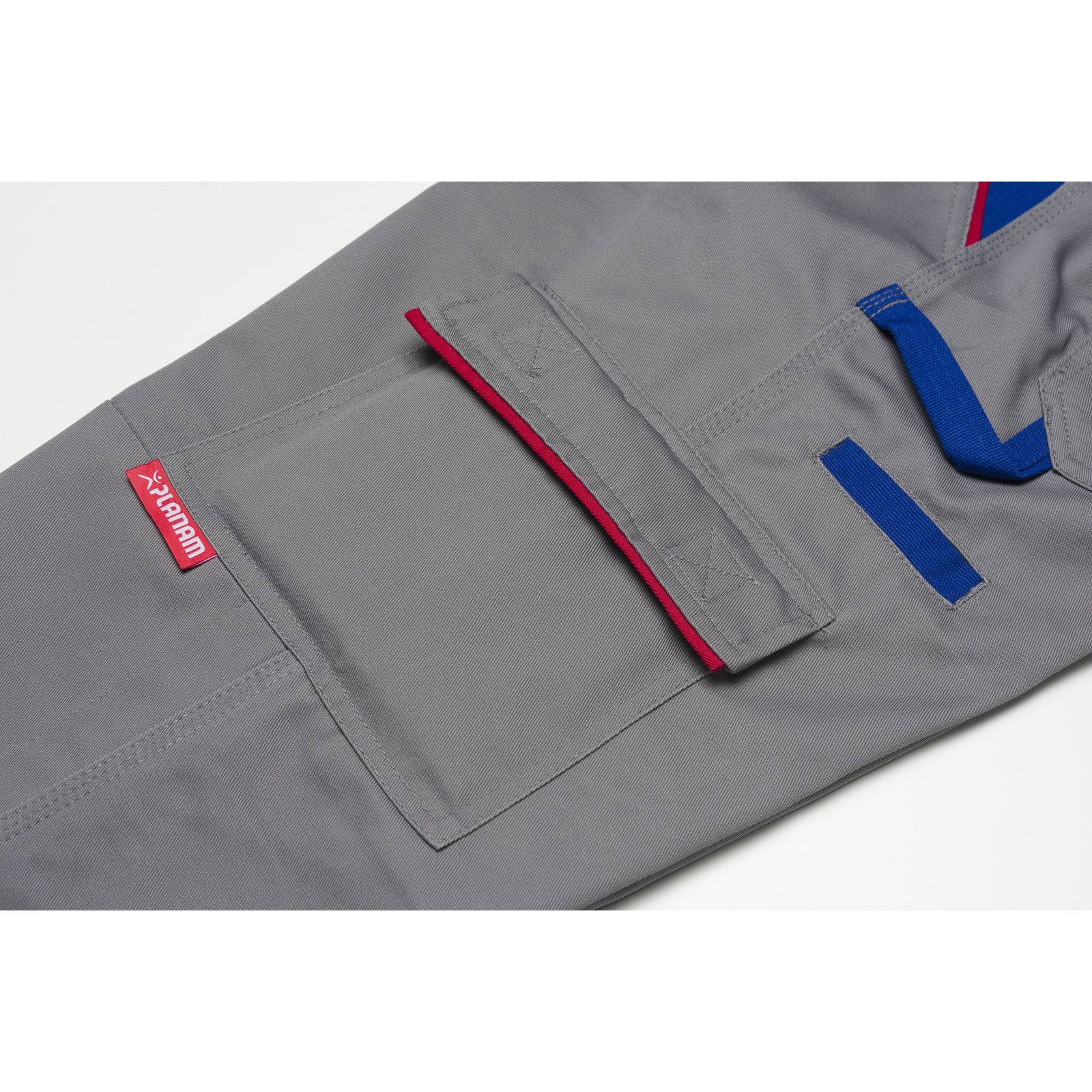 Planam Highline Trousers slate/black/red - Everything in its place: The thigh pocket keeps your important tools to hand at all times.