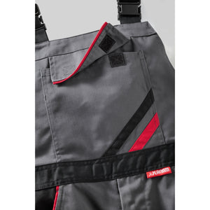 Planam Highline Dungarees zinc/royal blue/red - The bib pocket with flap and Velcro closure provides optimal storage space.